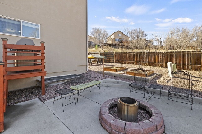 Building Photo - Spacious Home with Finished Basement, Granite Kitchen & Fenced Yard Near Fort Carson