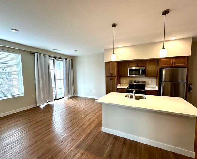 Kitchen & Living Rm w/ Balcony - The Downtown on Grant