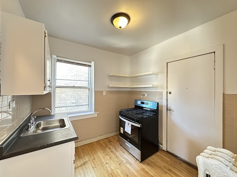 Building Photo - 7147 S Constance Ave