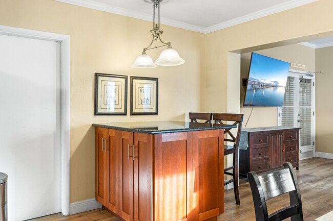 Kitchen island with granite counter top - 115 Park Ave