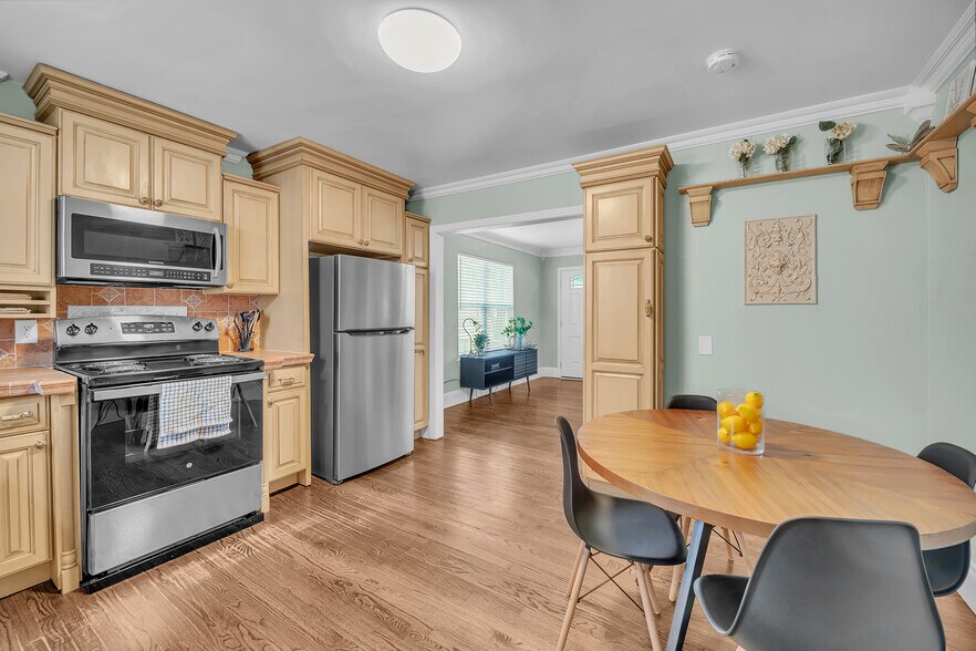 Updated full kitchen with cookware, dishes, and appliances. - 2301 North Dr