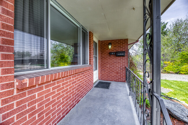 Own private porch to sit and enjoy the outdoors. - 1735 Upham St