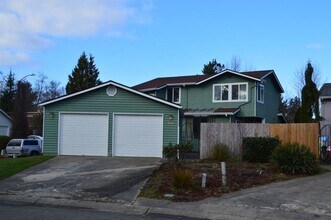 Building Photo - Beautiful and Bright Corner Lot Home in Ev...