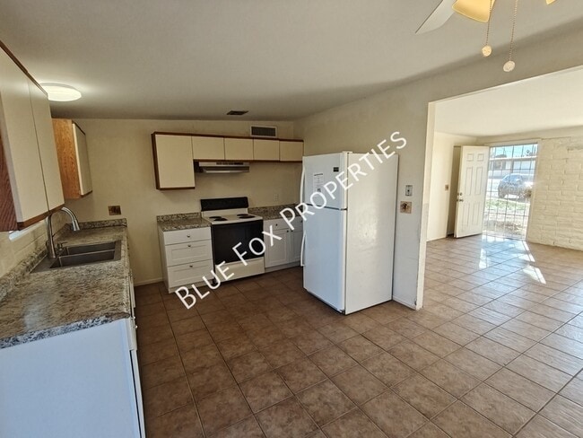 Building Photo - 3755 S Amos Pl