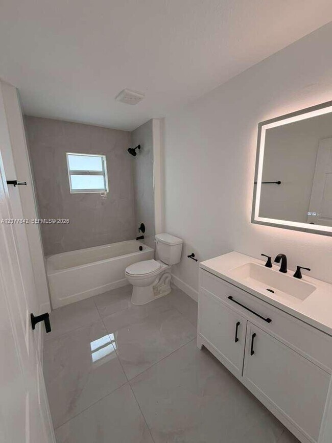 Building Photo - 8636 100th Ct
