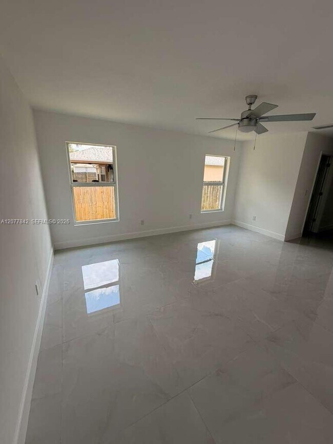Building Photo - 8636 100th Ct
