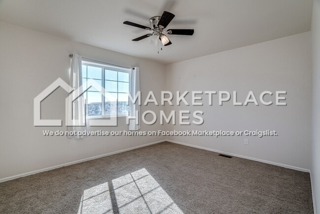 Building Photo - 9799 Desert Lily Cir