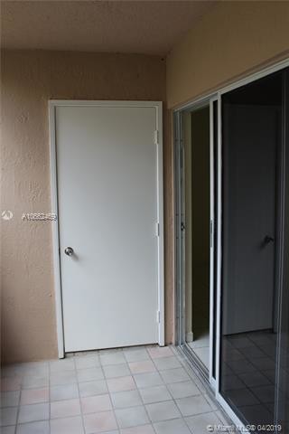 Building Photo - 4680 NW 102nd Ave  104-20