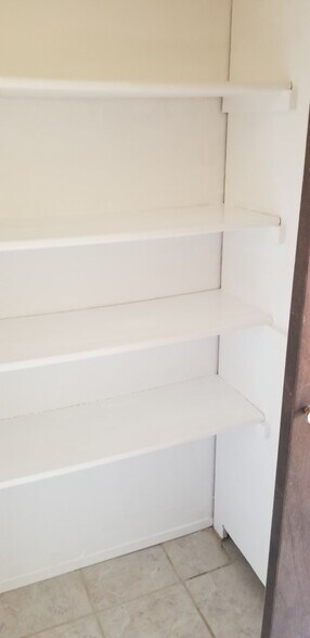 SHELVES IN CLOSET - 511 Constitution Ave S