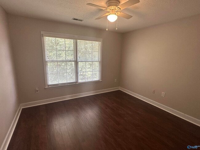 Building Photo - 129 Cannes Dr SE