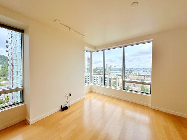 Building Photo - Spacious, open-concept 1-bedroom 7th floor condo in the South Waterfront District.