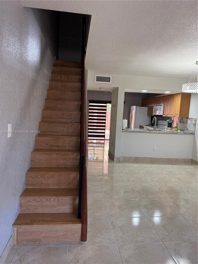 Building Photo - 5967 W 18th Ct