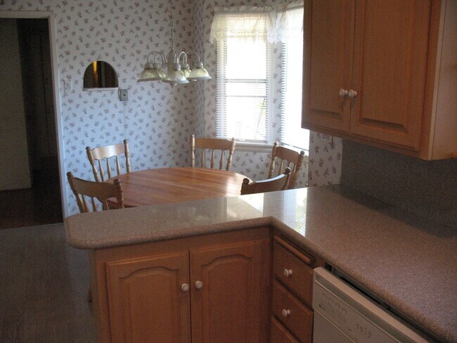 Kitchen Table - Mini Blinds. Loads of natural light - 3121 W Wyoming Ave