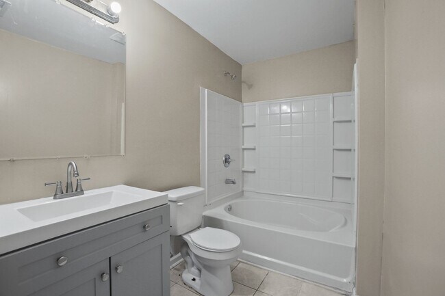 Building Photo - Spacious Three-Bedroom Condo with In-Unit Laundry