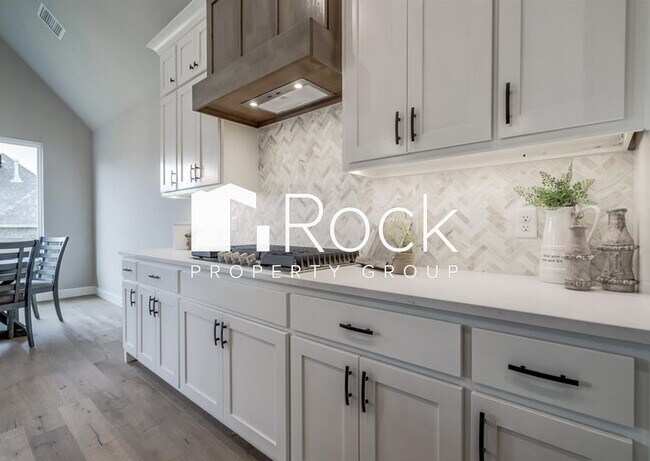 Building Photo - Stunning 4 Bedroom/2.5 Bathroom Home in Gated Community ~Built in 2023~