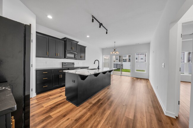 Building Photo - Modern Duplex with Spacious Design & Upsca...