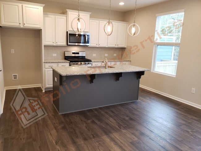 Building Photo - Beautiful Luxury 3 Story 3 Bedroom Townhome with 1st Floor Guest Suite, Attached 2 Car Garage, Co...