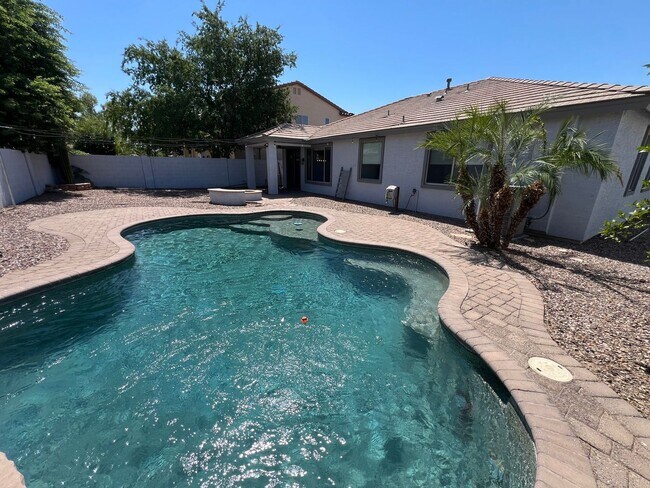 Building Photo - Gorgeous, upgraded home with a sparkling p...