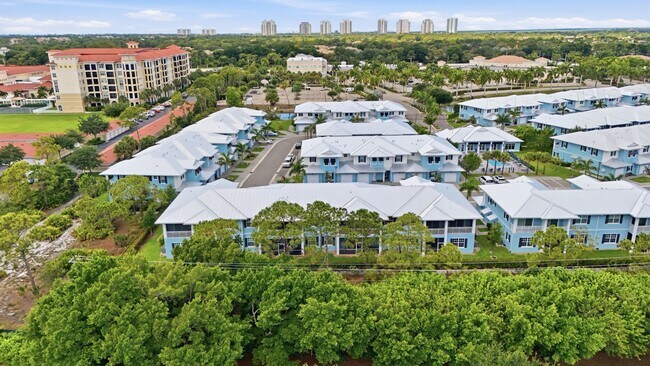 Building Photo - Fully Furnished 3 Bedroom, 3.5 Bath Townhome