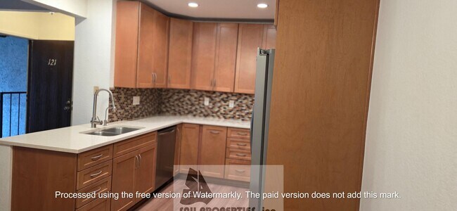 Building Photo - Beatiful Home in the Gated Sea Spray Community!