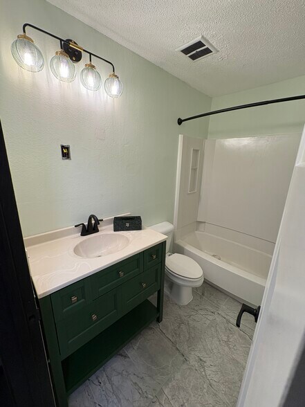 High end bathroom tile flooring - 907 Coulee Rd