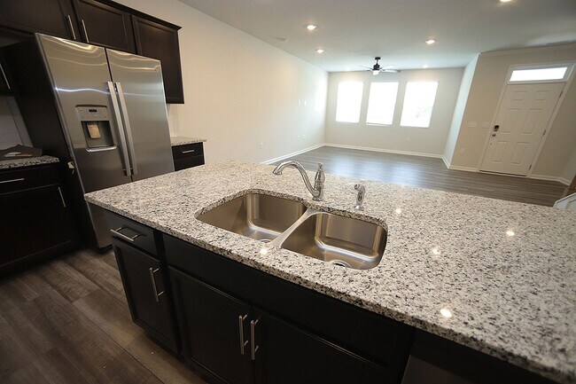 Building Photo - Beautiful 3 Bed+Bonus+2 Car Garage Townhome in New Wake Forest Community