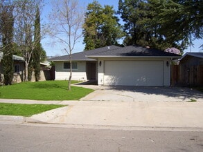 Building Photo - Recently remodeled home offering many upda...