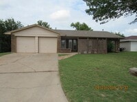 Building Photo - East side! Updated! Granite counter tops! Hard surface flooring throughout!