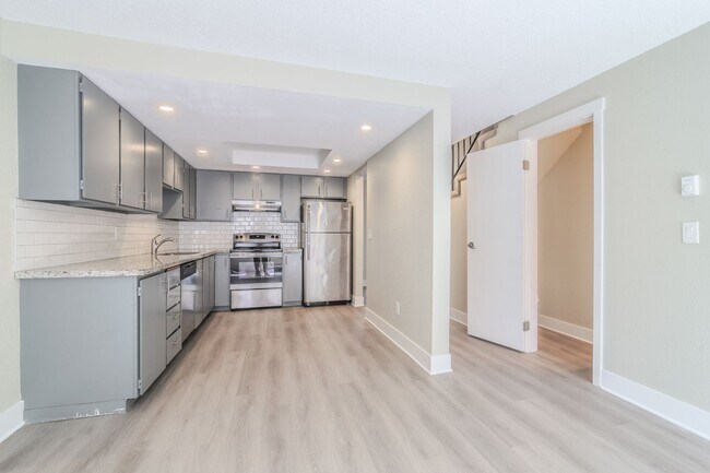 Building Photo - Open Concept Townhome with Balcony