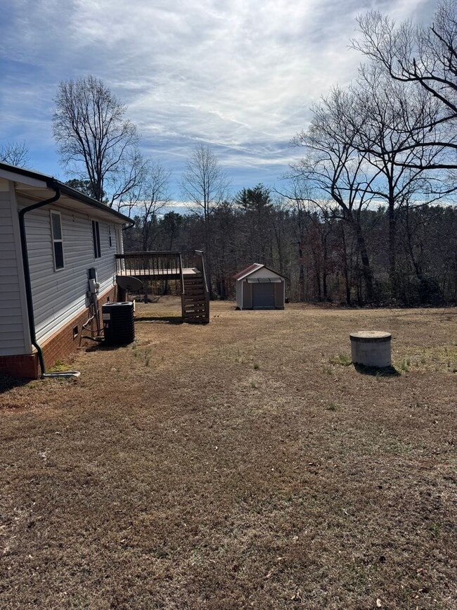 Building Photo - Spacious 4-Bedroom Rural Home on Private Acreage