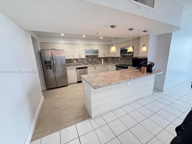 Building Photo - 5825 Collins Ave