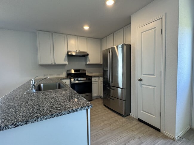 Building Photo - Like new 4/2.5 home (2023) in Morgan Heights with loft and big yard