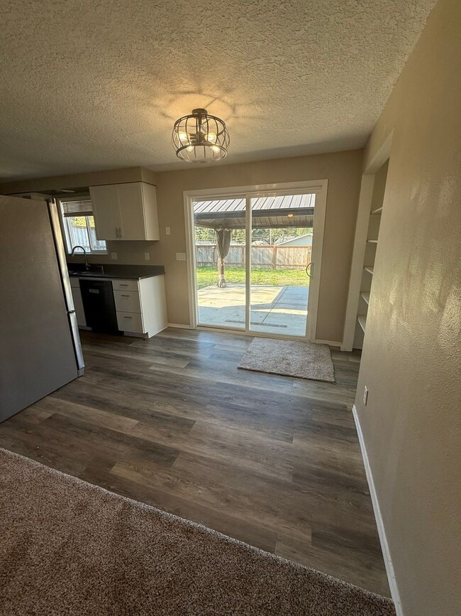 Building Photo - Updated 3+ Bedroom 2 Bath House with Large Fenced In Yard