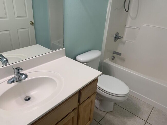 Building Photo - "Spacious 4-Bedroom Gem with 2 Full Baths ...