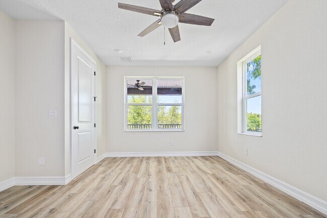 Building Photo - MODERN 4-BEDROOM TAMPA HOME | BUILT 2023 | FENCED YARD | PET FRIENDLY