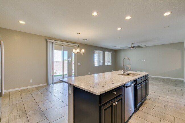 Building Photo - Beautiful Next-Gen Home with Private Entry Suite & Spacious Backyard