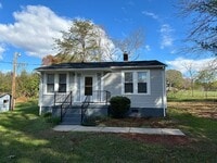 Building Photo - Charming Two Bedroom Home