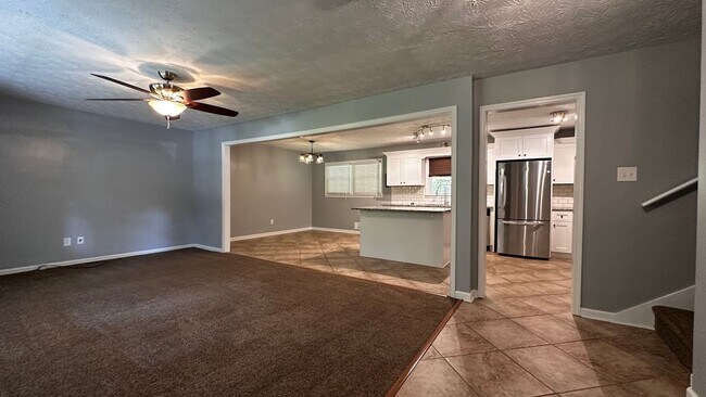 Building Photo - Spacious 4-Bedroom, 3-Bath Home with Moder...