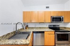 Building Photo - 9745 E Bay Harbor Dr