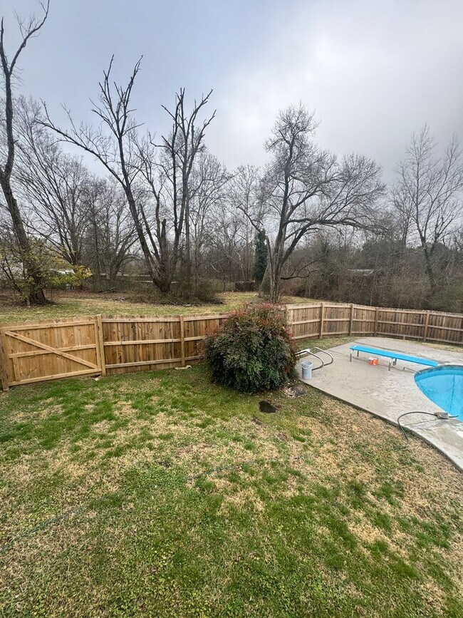 Building Photo - 4 bedroom 2.5 bath with large yard and in ground pool