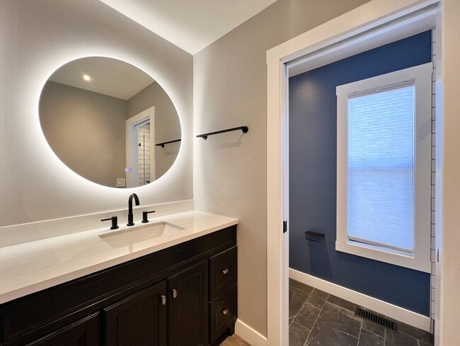 Building Photo - Beautifully Remodeled 2-Bedroom, 2-Bathroom Townhome with Single-Car Garage