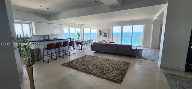 Building Photo - 9499 Collins Ave