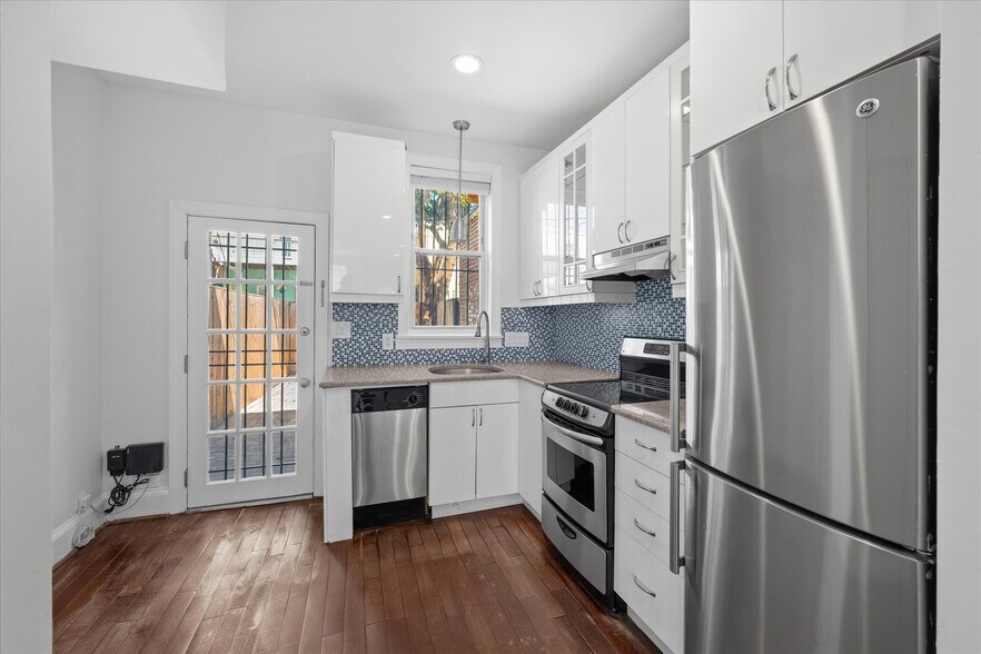 Renovated Kitchen with Access to Private Patio - 1208 1/2 Wylie St NE