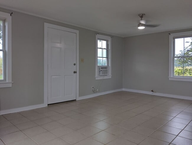 Building Photo - Adorable farmhouse ready for new long term...