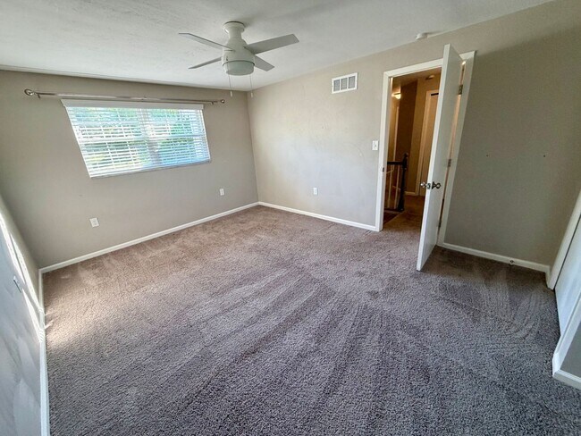 Building Photo - Modern Comforts Await: Spacious Rental with 2-Car Garage, Private Office, and Finished Basement w...