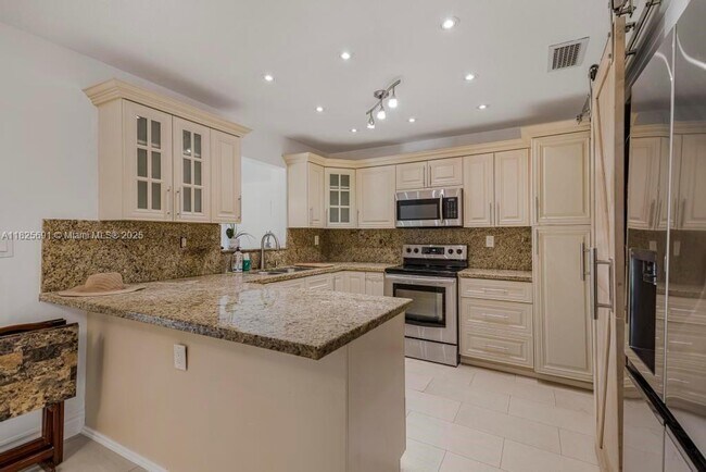 Building Photo - 5850 SW 149th Ave