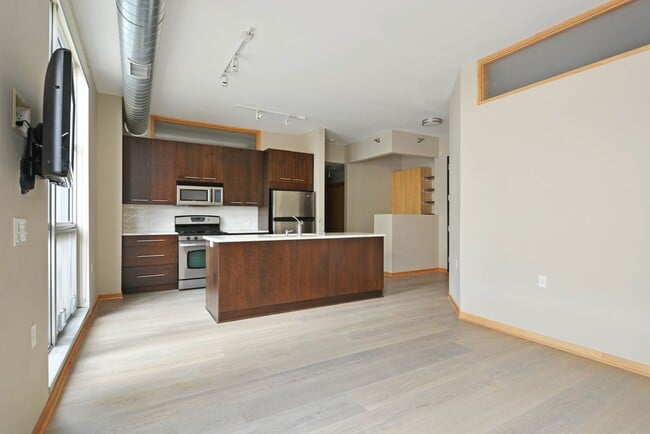 Building Photo - Modern 2-Bedroom Apartment with Private Patio in the Heart of Uptown