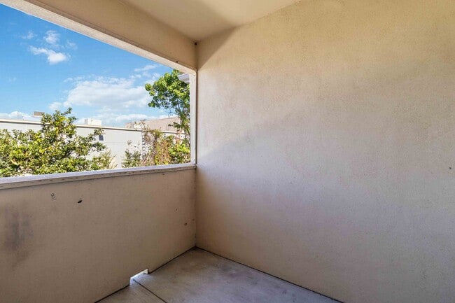 Building Photo - Spacious 1-Bedroom Condo for Annual Rent available now in gated Villagio Community