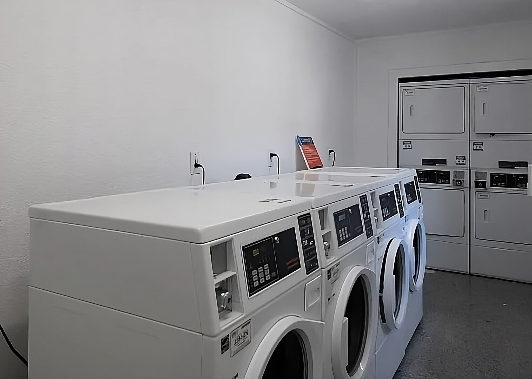 Coin or QR-code-operated laundry steps from unit - 1700 SW 16th Ct