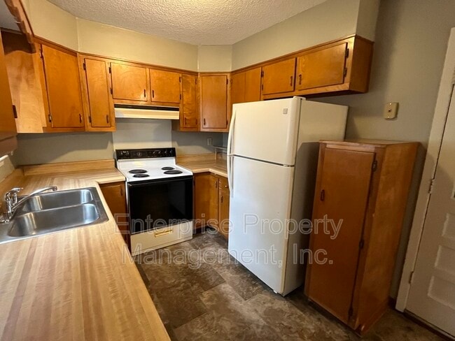 Building Photo - 6324 Woodgreen Dr